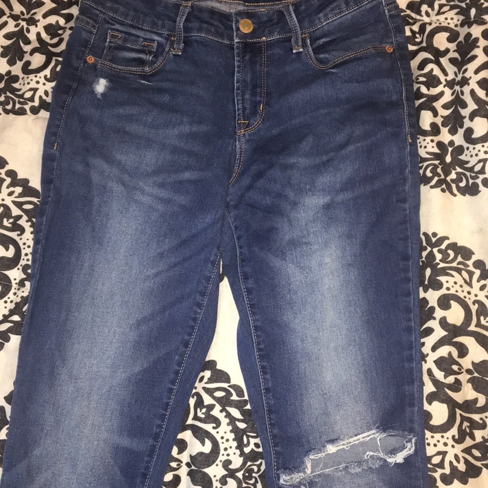 Dark blue ripped jeans